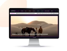 Laptop monitor displays a screenshot of the Lana home page