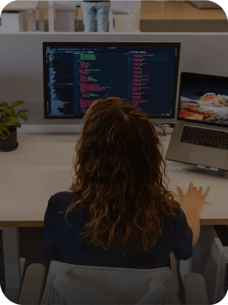 person at computer coding