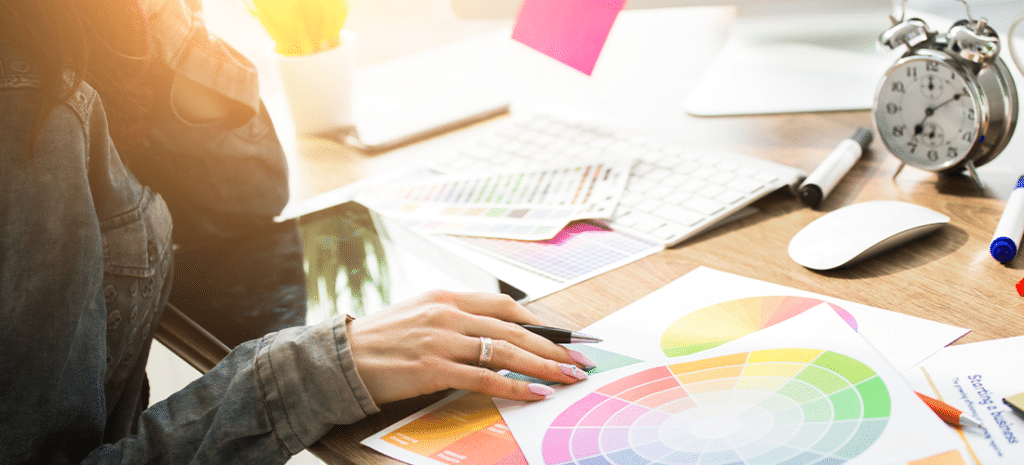 designer working with color palettes at desk