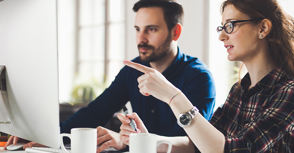 an agency rep explains the benefits of a hosting package to a client