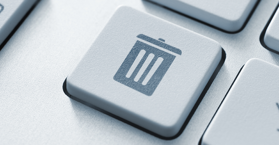 computer key with trash can icon