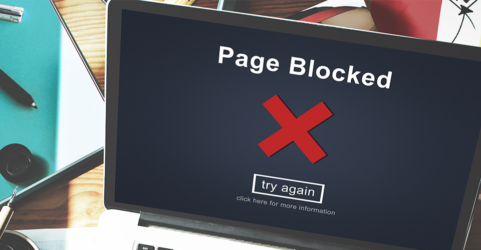 How To Disable Plugin On Specific Page WordPress. laptop with on screen text reading Page Blocked with a large red X