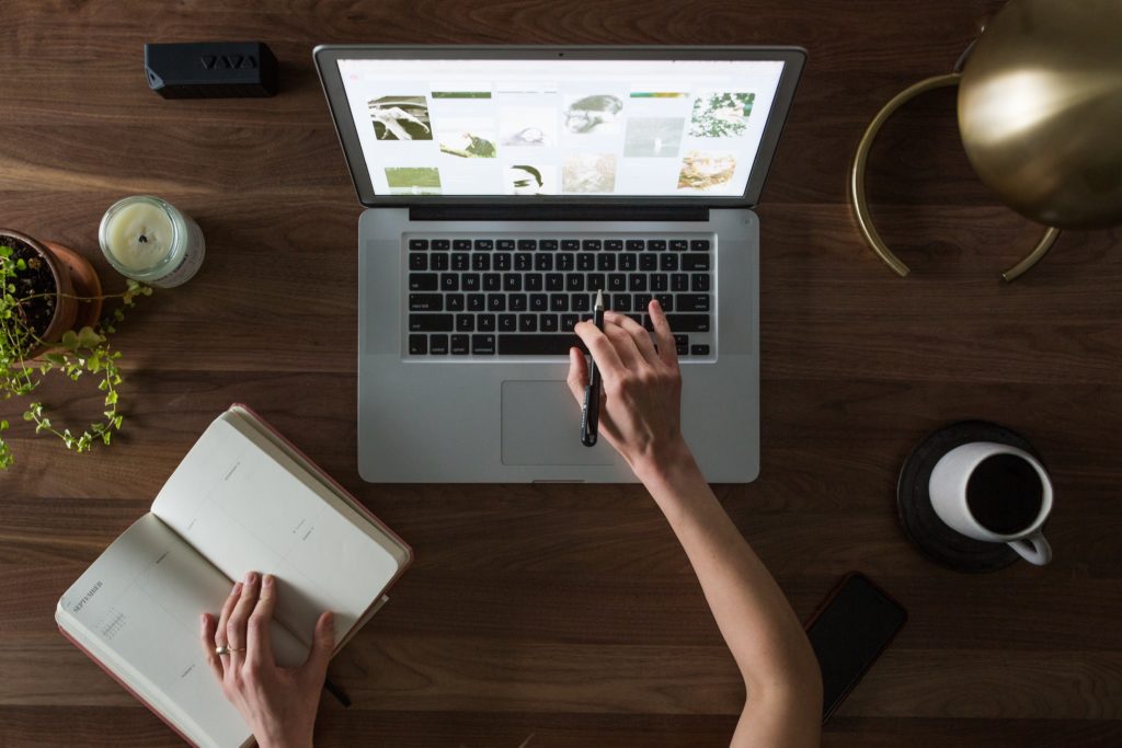 person working on laptop transferring from Weebly to WordPress