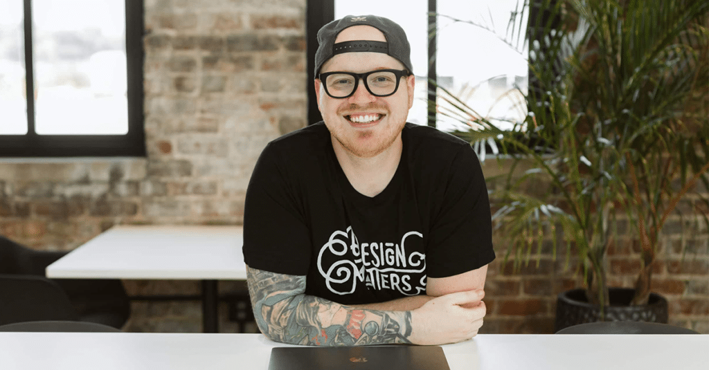 Marketing strategist Davey Owens sporting a Design Matters t-shirt