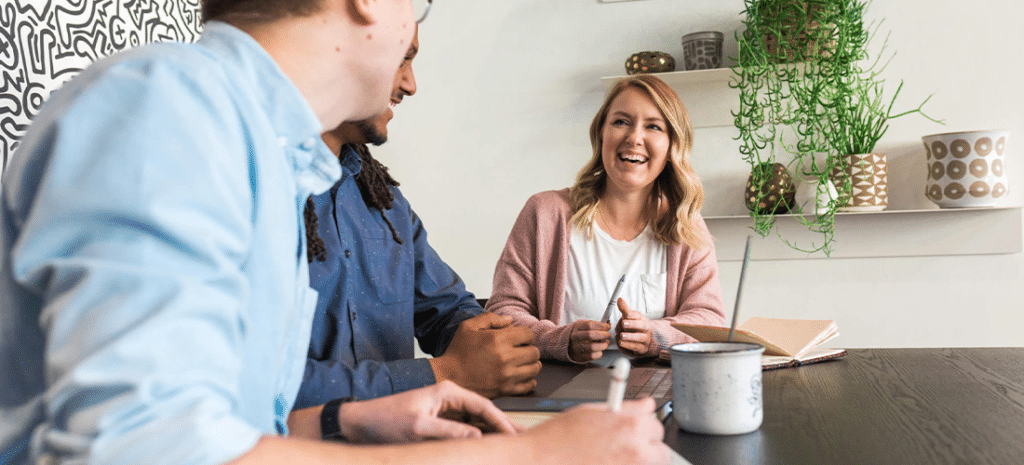 Marketing team talking in meeting room
