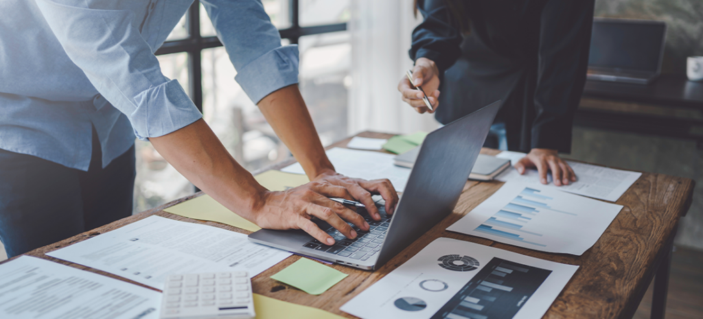 WooCommerce specialist working at desk