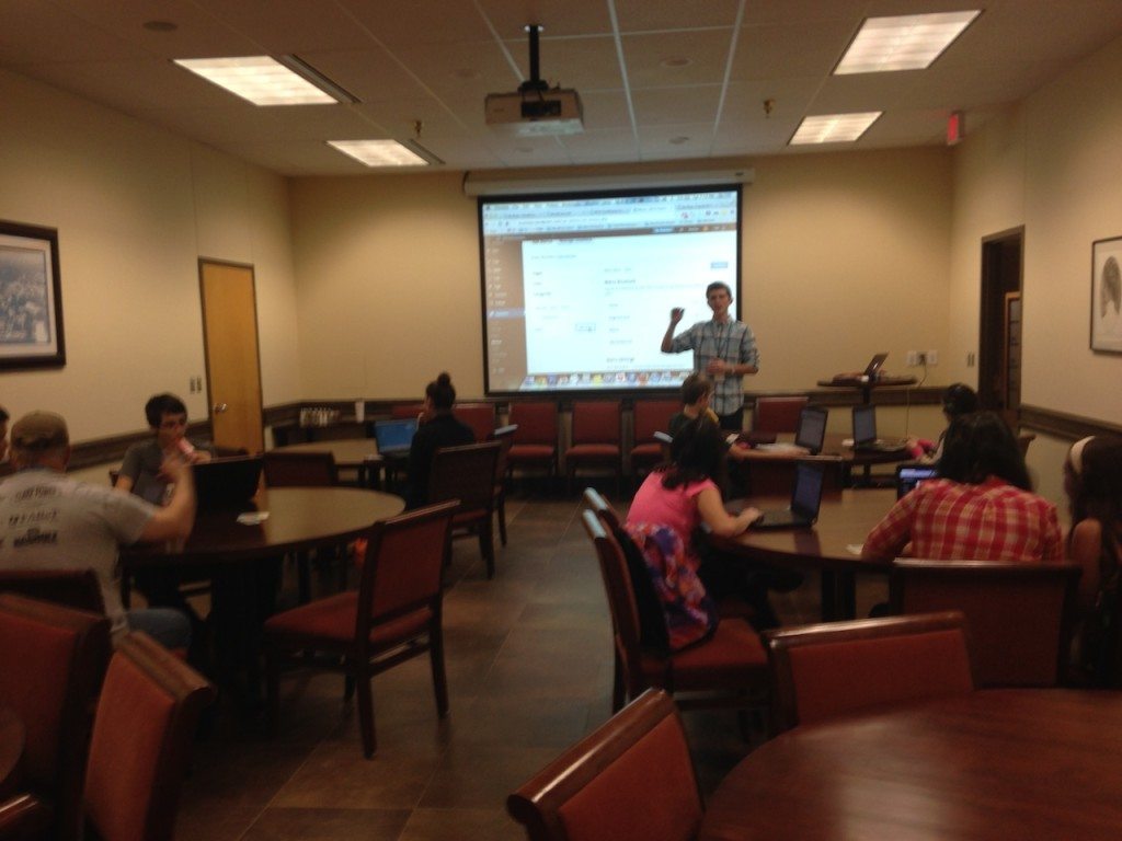 Taylor Christensen talking to a group of 13-18 year olds about the basics of WordPress