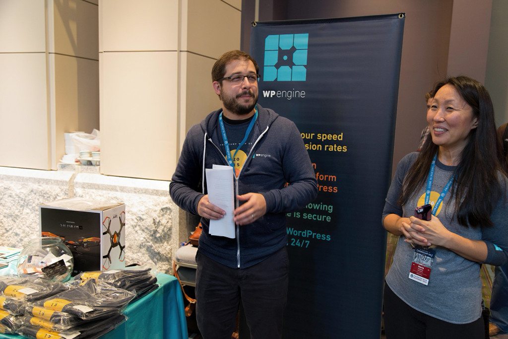 WordCamp US 2015 in Photos - WP Engine founder and CTO Jason Cohen announces the the “Hug A Dev” scholarship winner, Victor Ramayrat.