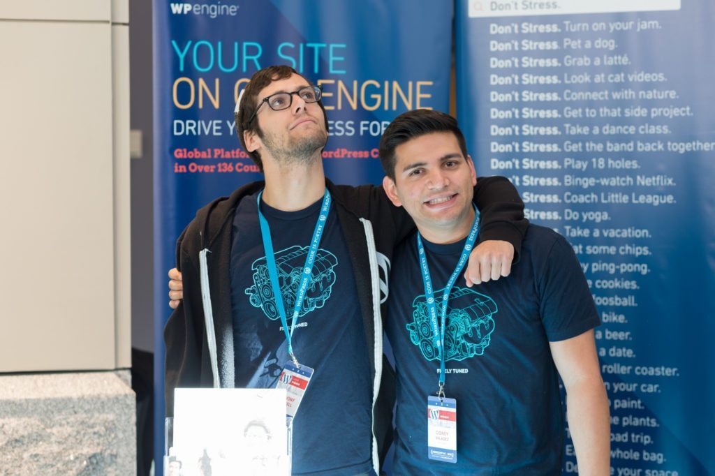 WP Engine's Anthony Burchell and Cidney Valadez pose for the camera. 