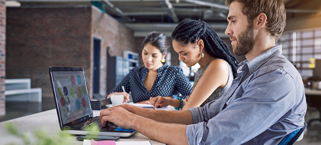 three wordpress users on their computers