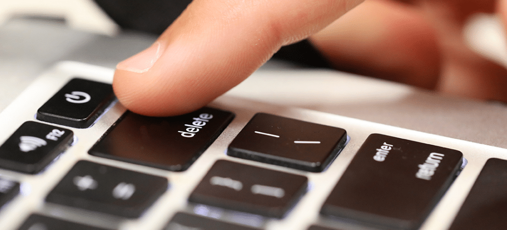 a person presses the Delete button on a keyboard