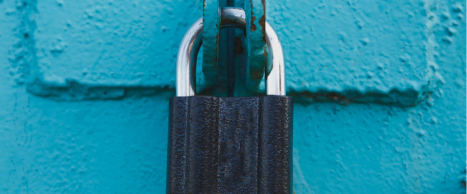Image of lock on bright blue background