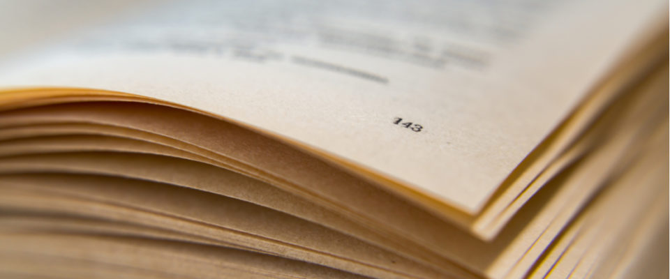 Numbered pages in a book representing pagination