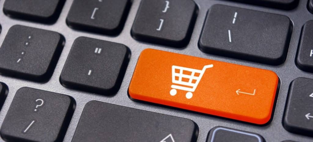 Ecommerce icon with the shopping cart on the enter button for the keyboard