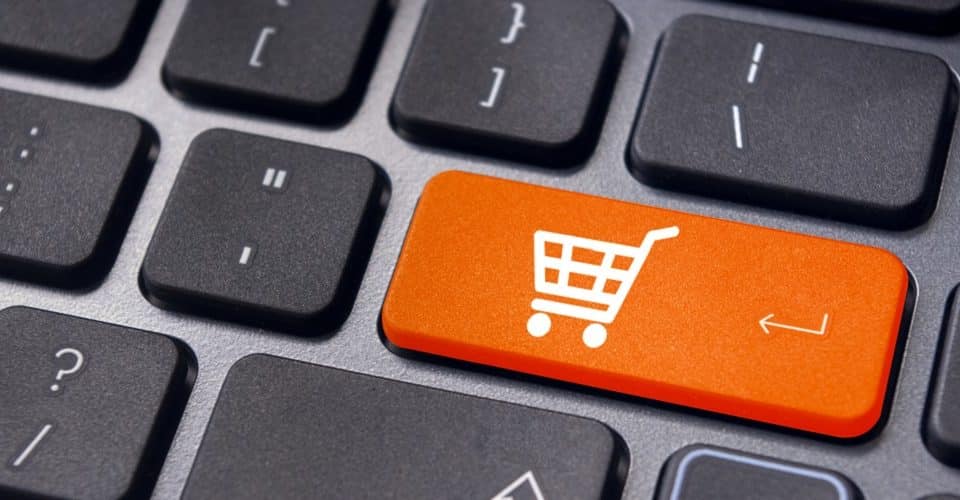 Ecommerce icon with the shopping cart on the enter button for the keyboard