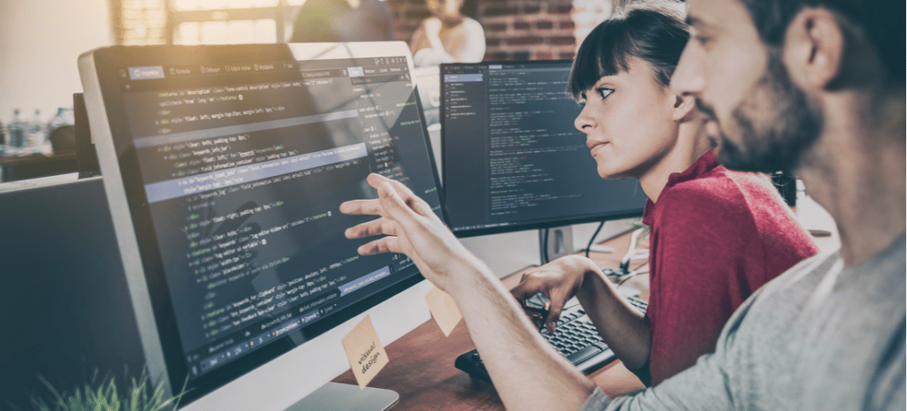 Two developers working on code