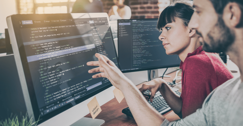 Two developers working on code