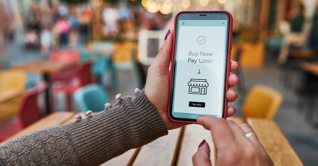 Expanding Payment Options Through Stripe Connect—Buy Now, Pay Later. image shows a person using a Buy Now Pay Later option while shopping via mobile