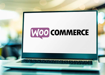 WooCommerce logo on laptop screen