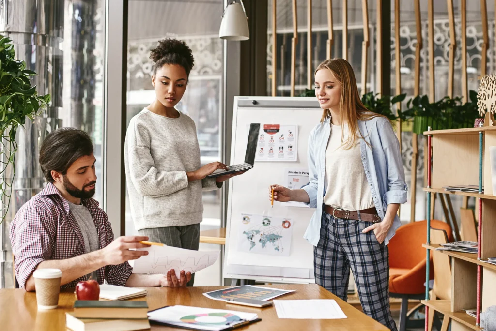 Three Agency employees in a planning session