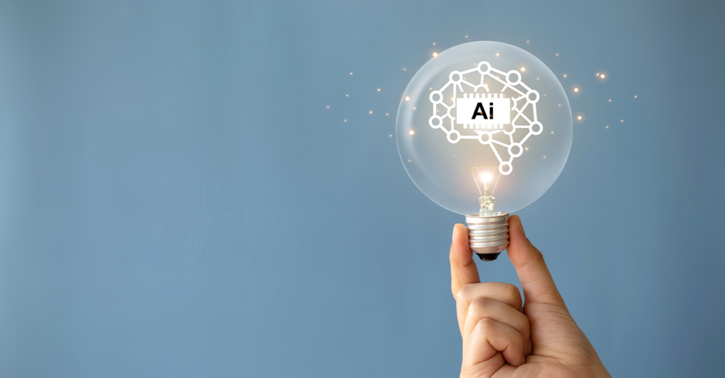 How to humanize AI content: A hand holding a lightbulb that says "AI."