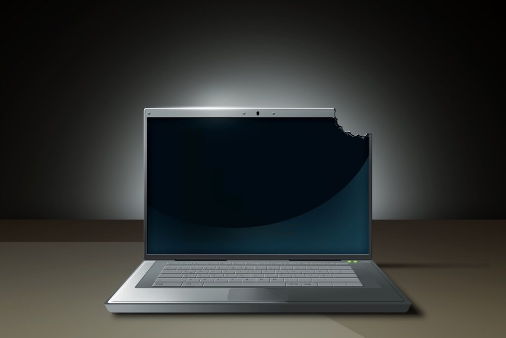 Laptop with bite taken out of it